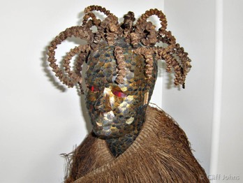 Junk Art, Trudy, life size torso covered in copper, with an 80 year old Polynesian raincoat 